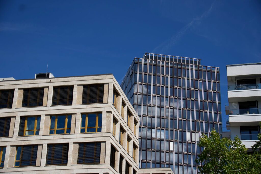 Contemporary architecture under a clear blue sky in Berlin, Germany.