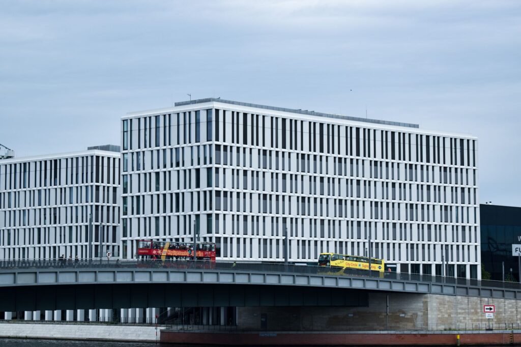 A contemporary office building with glass facade in Berlin, Germany, showcasing modern architecture.
